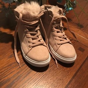 Pink faux fur high top sneakers